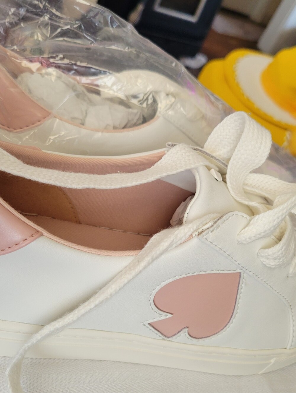 Kate SPADE Women's White Sneaker with Pink Heart Accent